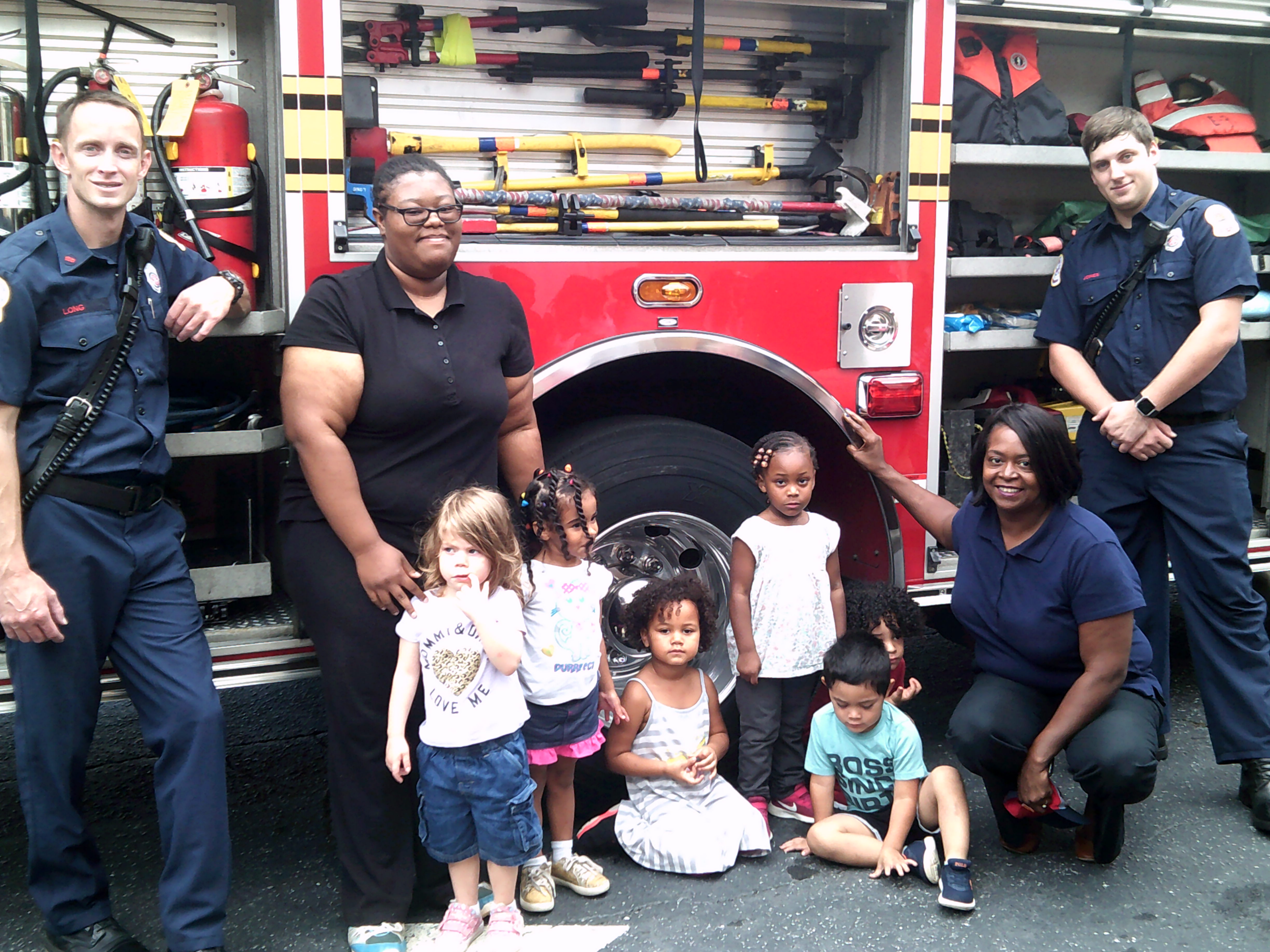 fire officers with kids