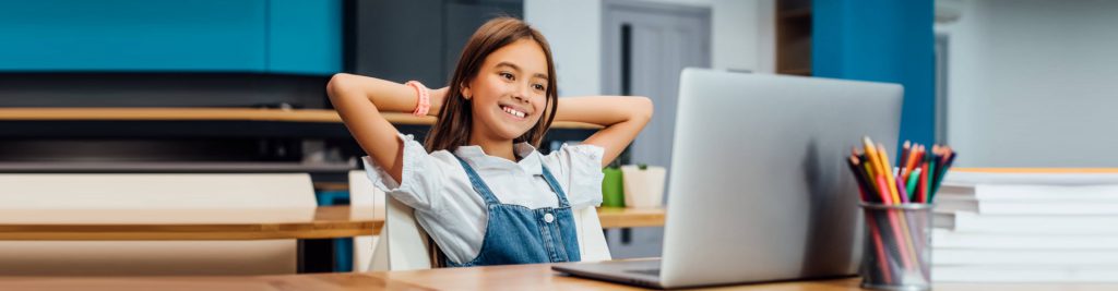 student using her laptop